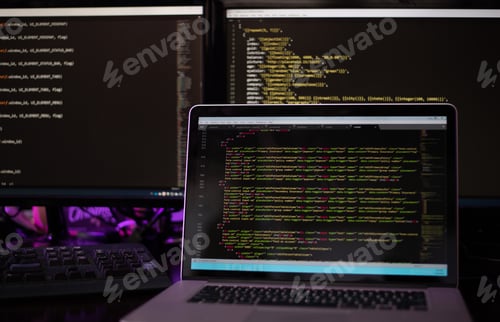 Preview: Three computer screens with computer programming code