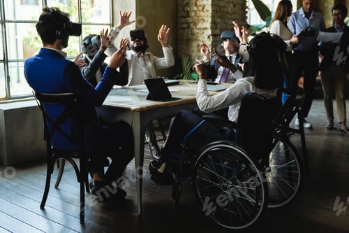 Preview: Diverse business people work with virtual reality inside office - Focus on woman on wheelchair