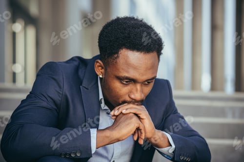 Preview: African american businessman in business suit frustrated got bad news from work