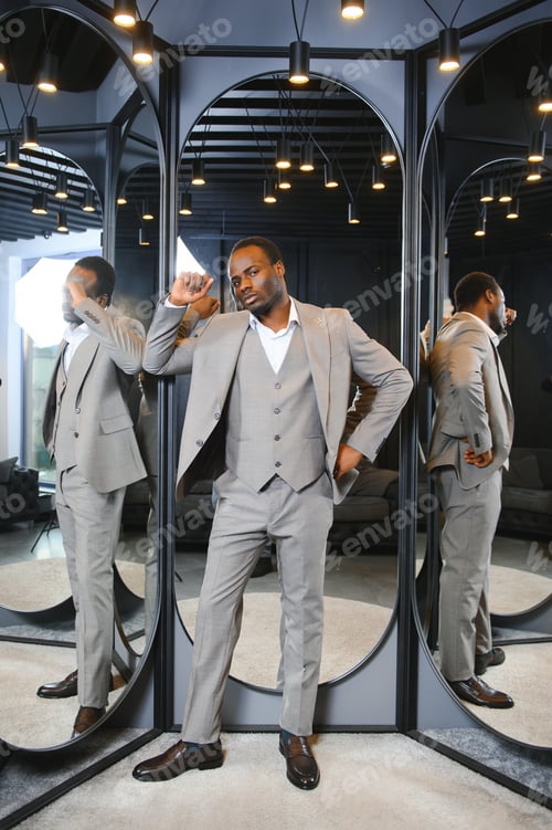 Preview: Young african man shopping in clothing store