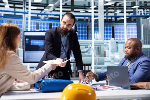 Preview: Factory manager gives paperwork files to investors reviewing financial statement
