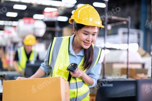 Preview: Worker working in the large depot storage warehouse happy smiling packing box at cashier counter