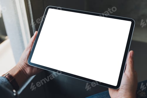 Preview: Mockup image of a woman holding black tablet pc with blank white screen in cafe