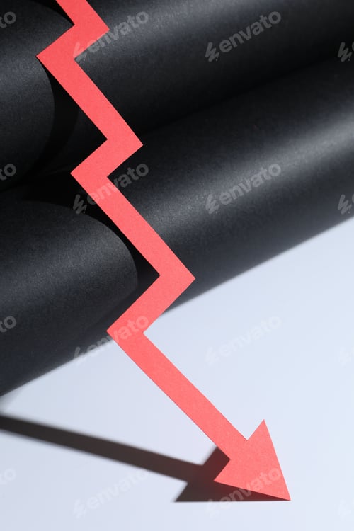 Preview: One red paper arrow on color background, closeup
