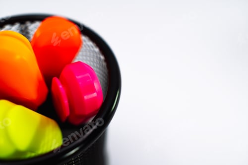 Preview: Colored pencils in a pencil case on white background