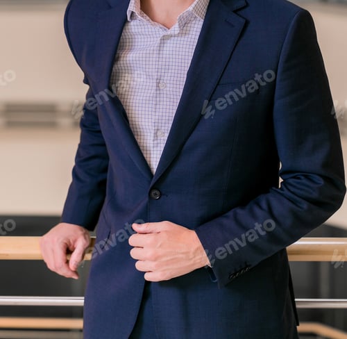 Preview: Caucasian businessman in a stylish suit in the office