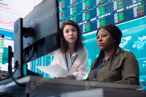Preview: Coworkers team analyzing infographics to provide solutions on an issue