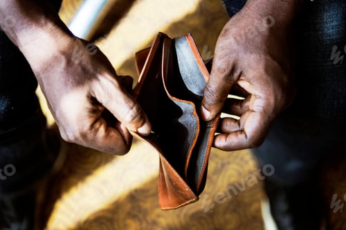 Preview: Man checking his empty wallet