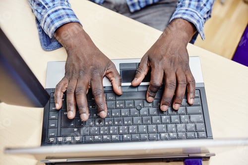 Preview: Close-up of man using laptop