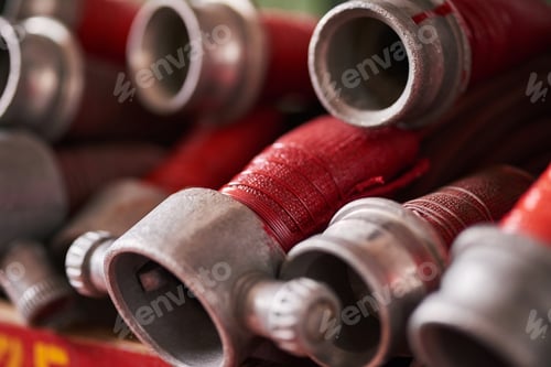 Preview: Ready to tackle any flame. Cropped shot of coiled fire hoses.