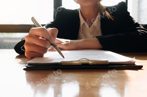 Preview: Close up business man signing contract making a deal with business partner - Business deal concept
