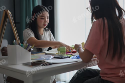 Preview: Teen Girls Doing Arts and Crafts at Home