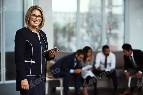 Preview: Portrait of a businesswoman holding a digital tablet