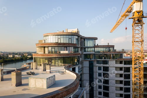 Preview: Aerial view of new modern skyscraper building under construction.