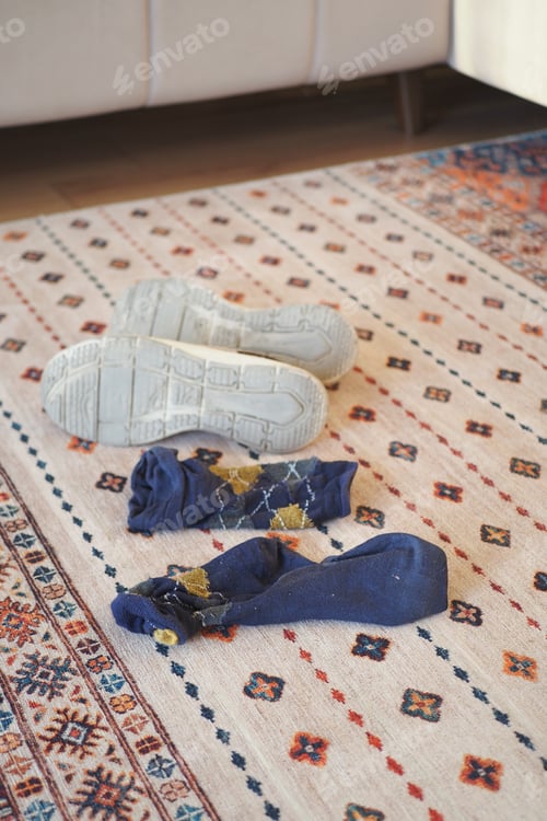 Preview: dirty sock and shoe on floor