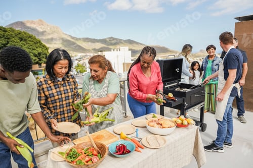 Preview: Multigenerational people doing barbecue at home's rooftop