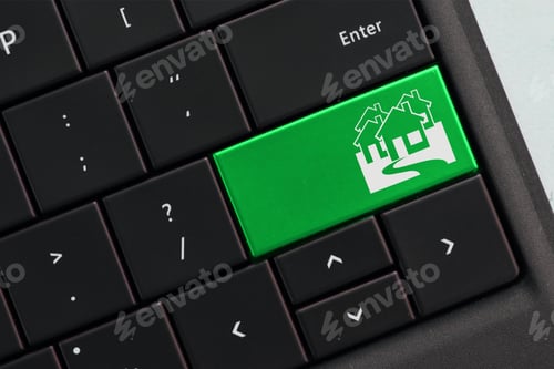 Preview: Concept - Computer Keyboard with green key housing market homes online real estate search browsing