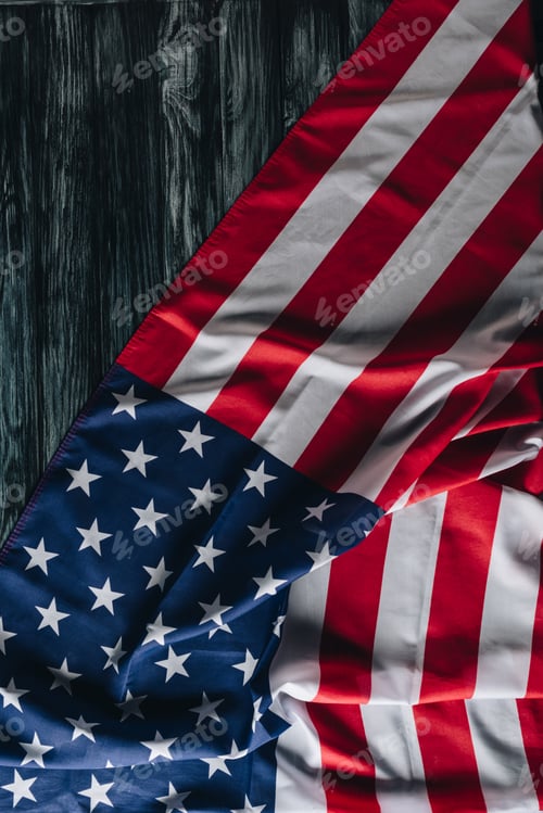 Preview: usa national flag on grey wooden surface, memorial day concept