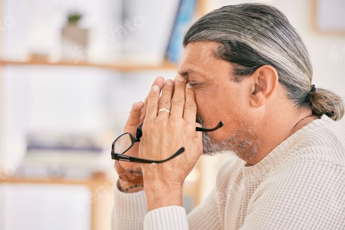 Preview: Frustrated senior man, headache and stress in debt, burnout or financial crisis at home. Mature mal
