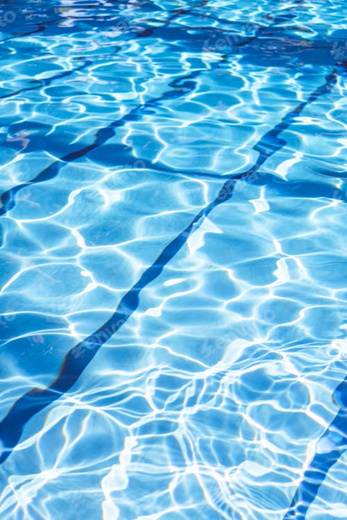 Preview: Ripple Water in swimming pool with sun reflection. Summer day at swimming pool.