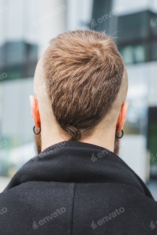 Preview: Stylish bearded man posing in the street