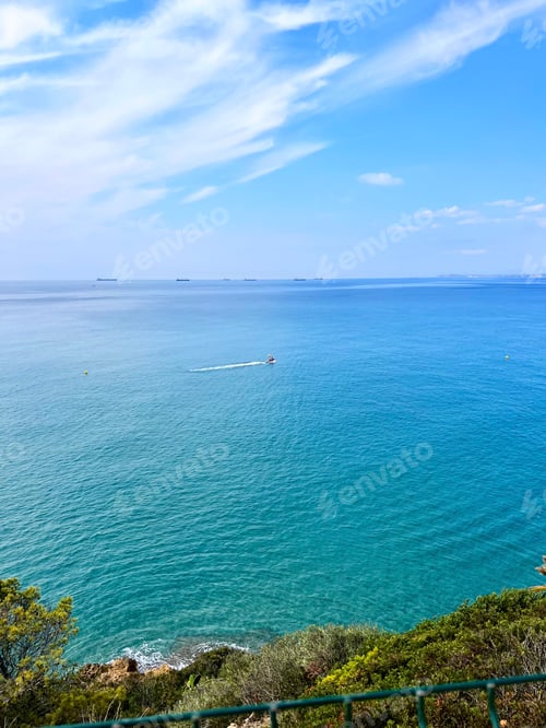 Preview: Tiny boat out in the ocean.