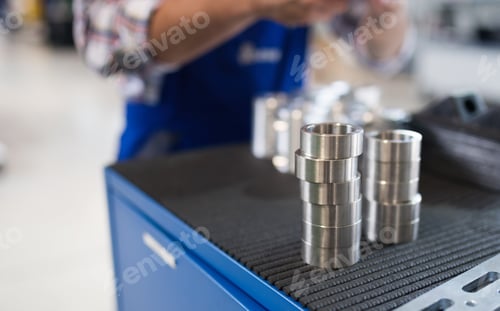 Preview: Bearings in industry factory with worker in background