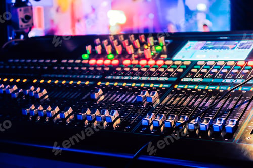 Preview: Closeup of an audio mixing control panel