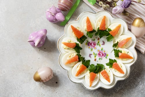 Preview: Stuffed eggs with cheese and salted salmon in the form of a carrot.