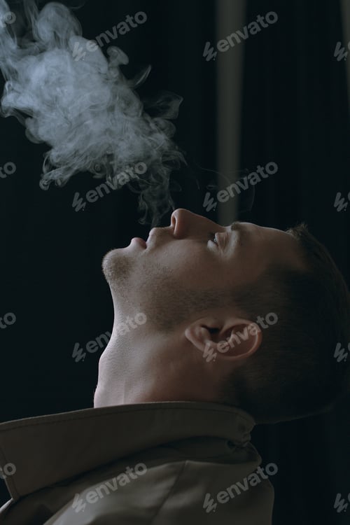Preview: A Handsome And Lonely Guy In A Cloak With A Cigarette