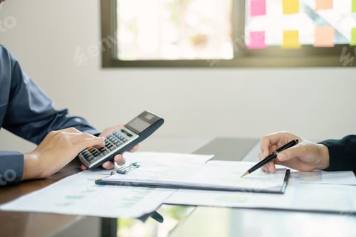 Preview: Two business leaders talk about charts, financial graphs showing results are analyzing and calculati