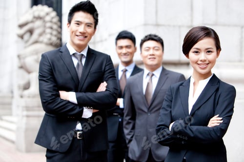 Preview: Portrait of confident business team outside a building, Hong Kong