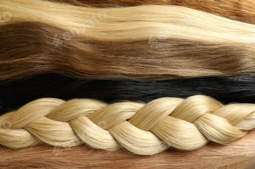 Preview: Different color female hair on whole background, close up