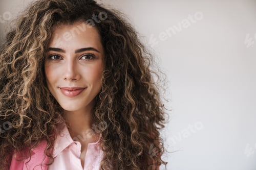 Preview: Photo closeup of happy beautiful woman smiling and looking at camera