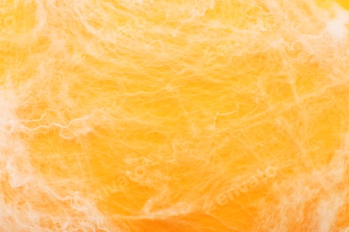 Preview: spider web on an orange background. halloween concept. copy space