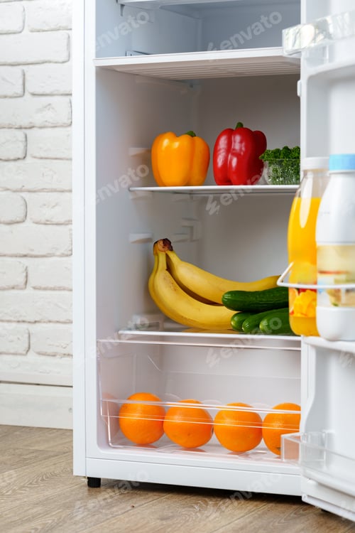 Preview: Open Refrigerator Door Showing Fresh Produce Inside
