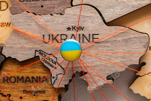 Preview: Ukraine flag pins and red thread for traveling and planning trip.