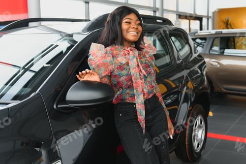Preview: Woman buying the car. Lady in a car salon. Elegant black girl. woman in car salon