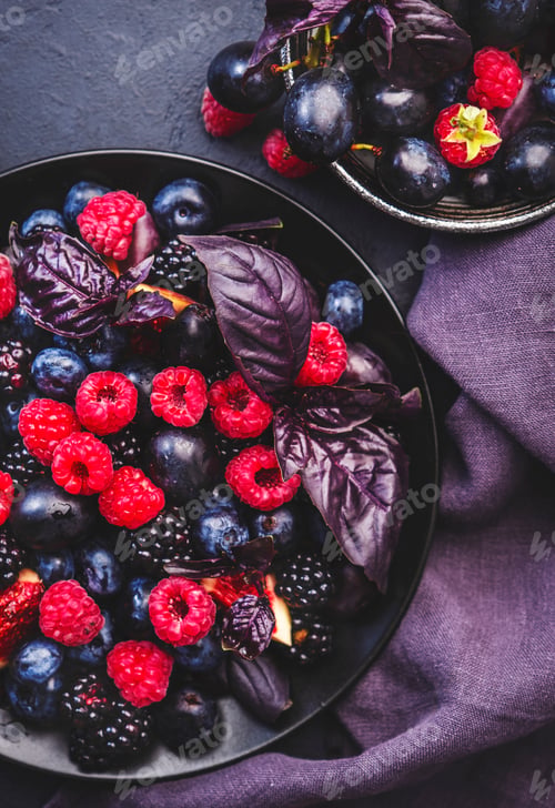 Preview: Summer blue and black berries fruit vegan salad: blueberries, blackberries, grapes, figs and basil