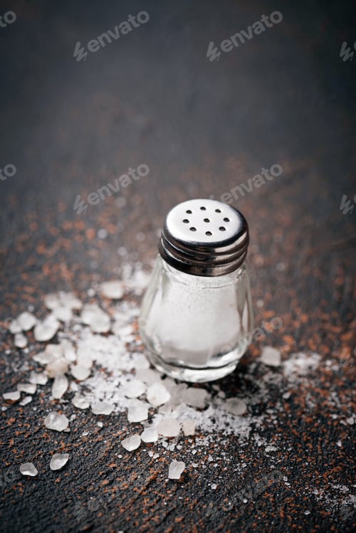 Preview: White sea salt on rusty background