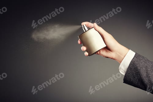 Preview: Man applying perfume