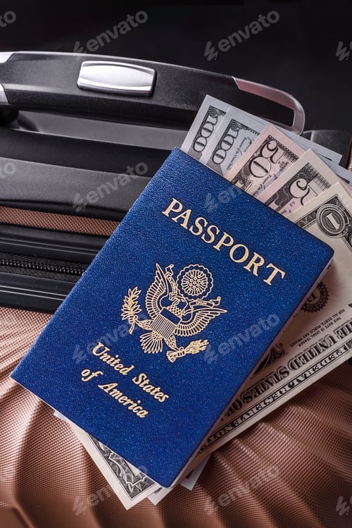 Preview: International passport of a USA citizen on a suitcase