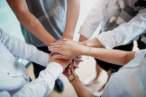 Preview: Business people with unity working together teamwork for success of the business.