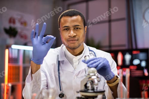 Preview: Modern medical research laboratory: portrait of scientist working, using microscope