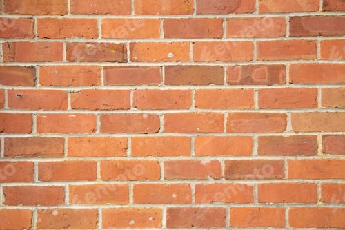 Preview: Orange brick wall with a classic staggered pattern and visible mortar joints, Auckland, New Zealand
