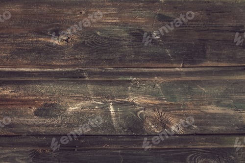 Preview: Dark brown faded wooden table, top. Shabby horizontal boards. Abstract texture, weathered timber