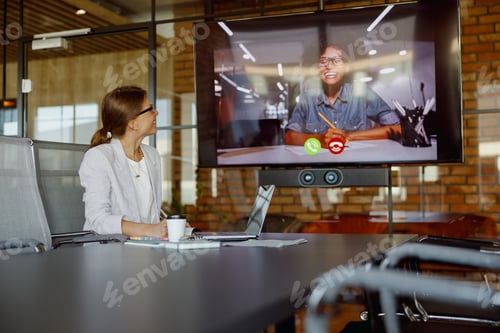 Preview: A woman is working indoors