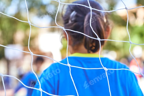 Preview: football goal net on a children soccer match