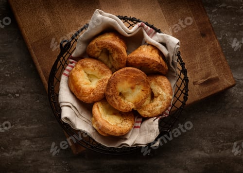 Preview: Top view of a bowl filled with freshly baked Yorkshire Puddings