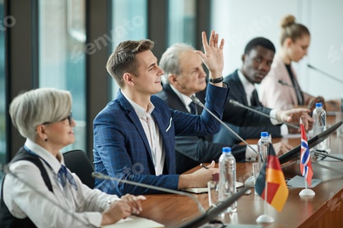 Preview: Businessman taking part at conference